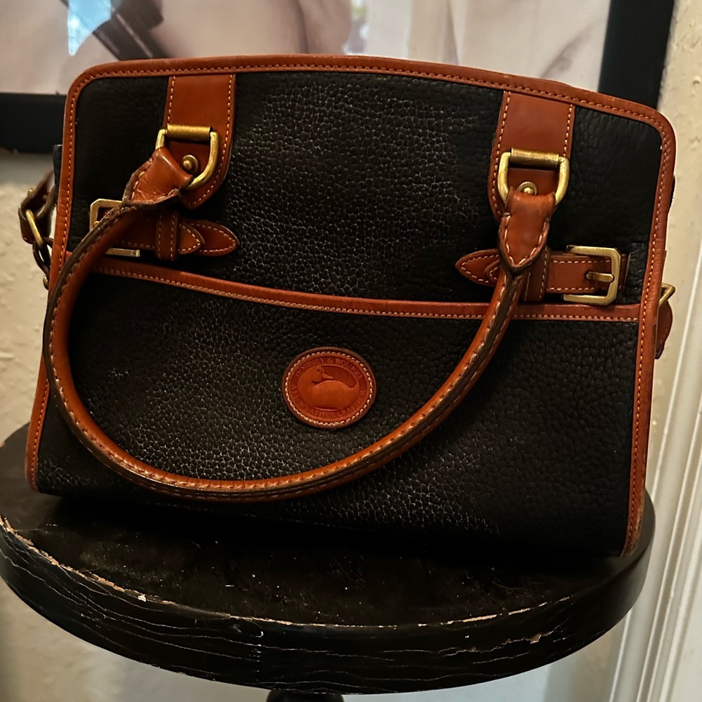 Dooney & Bourke Black and Brown Satchel with Brass Hardware